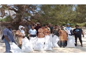 Community Members and Pupils Conducting a Beach Clean-Up